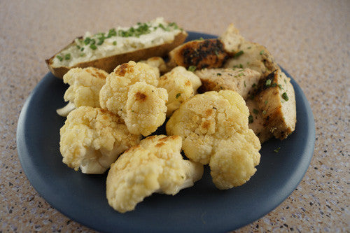 Pan-Seared Chicken with a Baked Potato & Sauteed Cauliflower